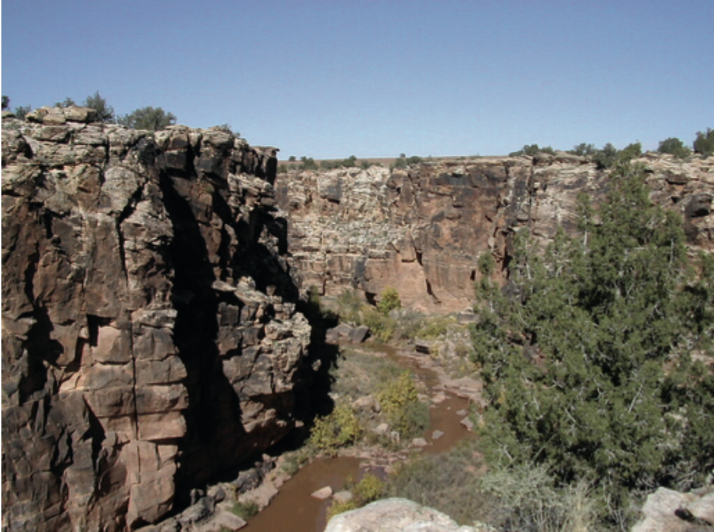Outcrops of Coconino Sanstone along Silver Creek in northeastern Arizona. Notice the fracturing in vertical and horizontal directions. Dual Porosity Types
